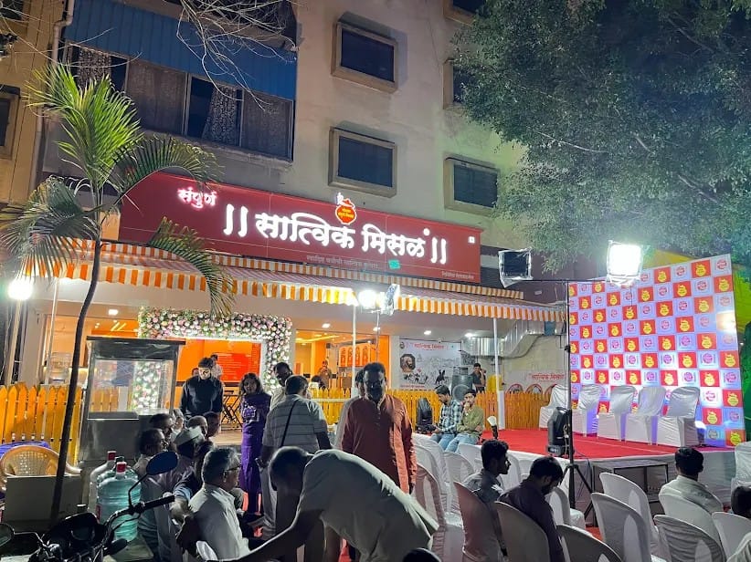 Crowd of guests seated at a Sampurn Satvik Misal outlet launch event